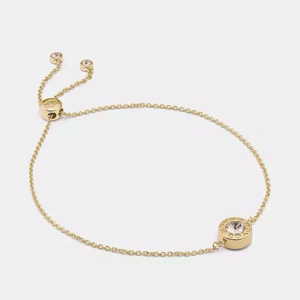Coach Gold Bracelet with Crystal Charm